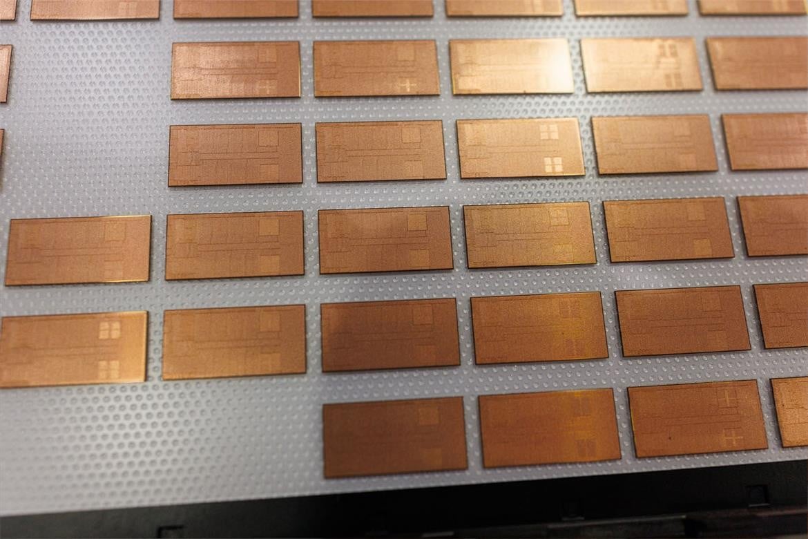 Separate chip molds lined up on a tray.